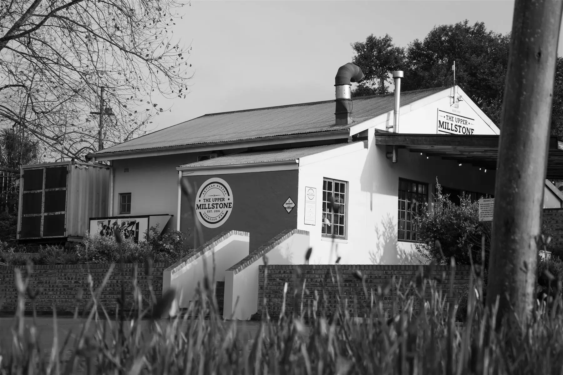 The Upper Millstone building, in black and white