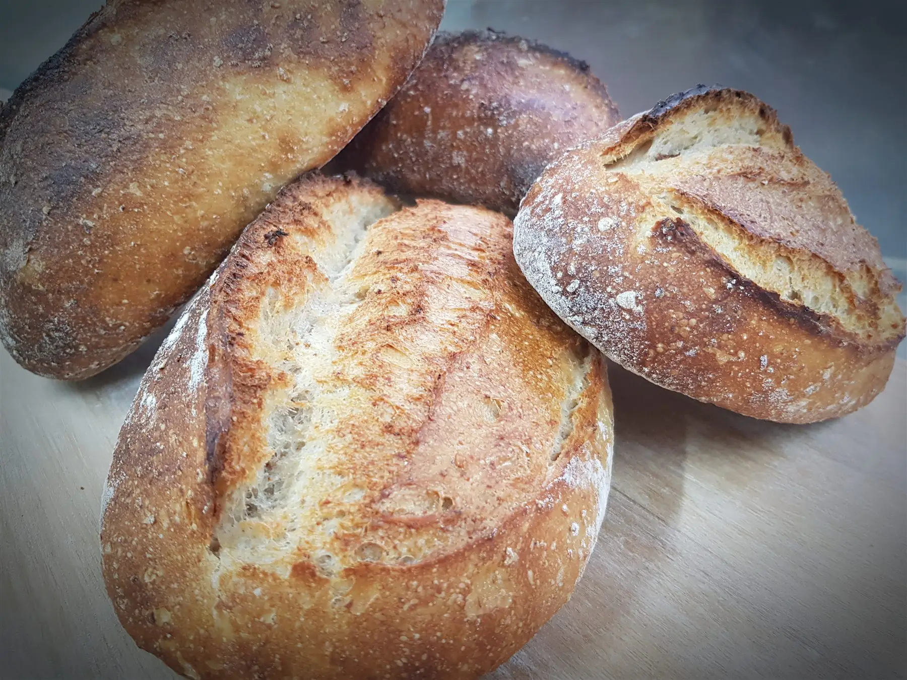 Freshly baked artisan sourdough loaves, hand-scored — The Upper Millstone